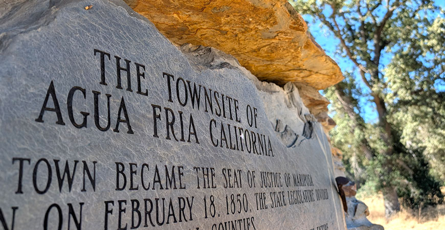 Closeup of stone marker for townsite of Gold Rush town Agua Fria